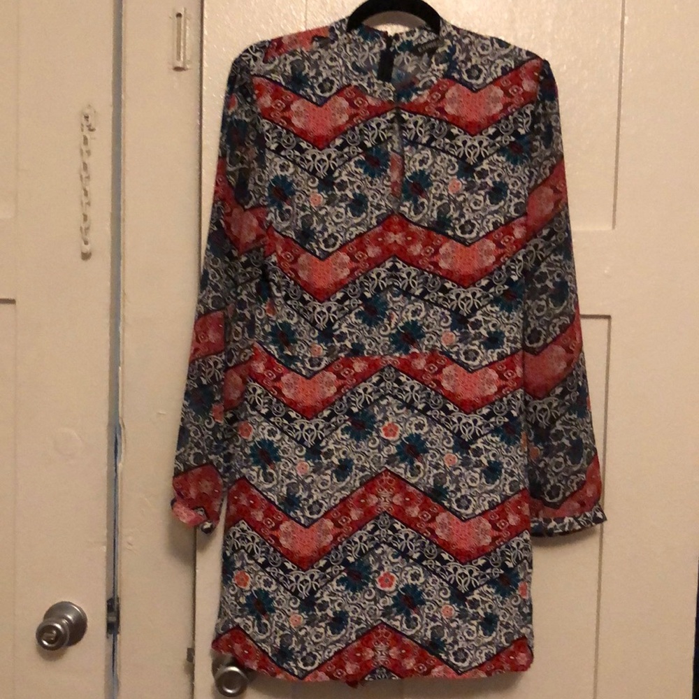 Floral long sleeved sexy romper size 10